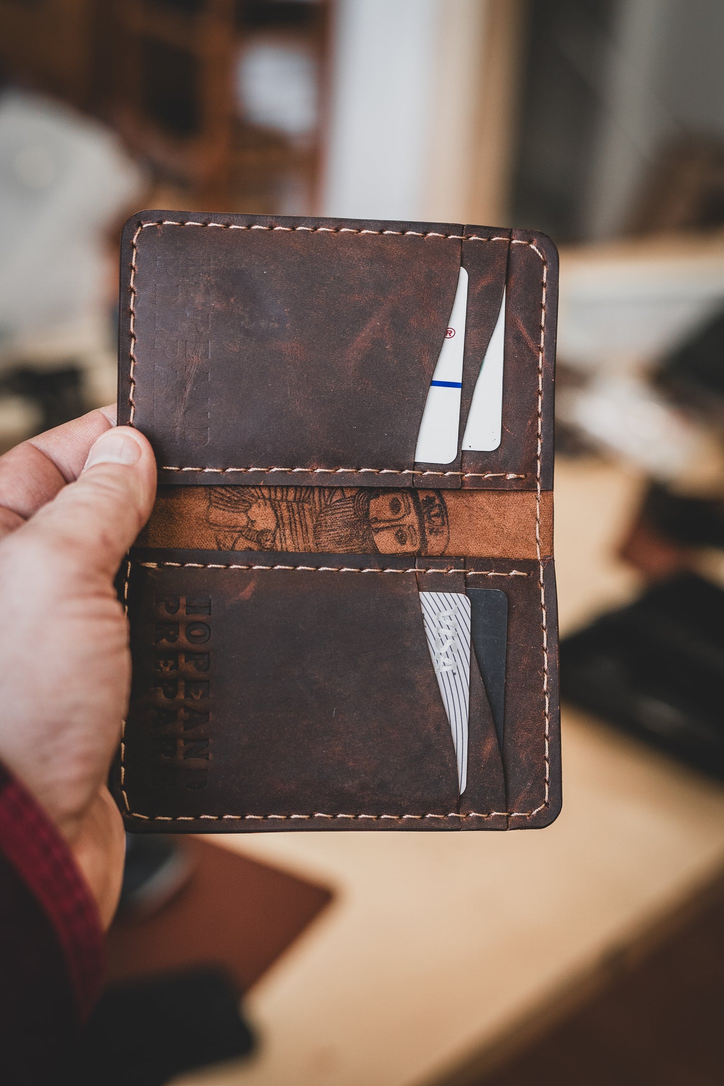 Bi-fold vertical 4 poche